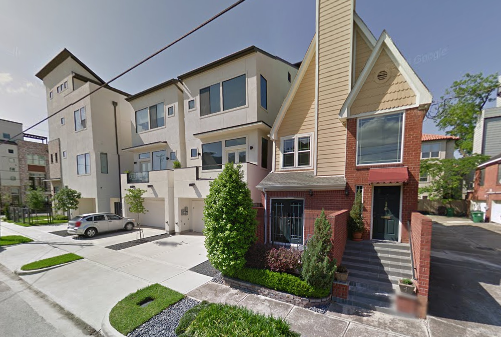 Two distinct homes side-by-side in Houston.